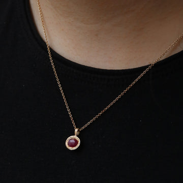 9ct Fairtrade Yellow Gold Textured Pendant with an Oval Ruby