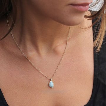 Textured Yellow Gold Pendant Set With A Freeform Australian Opal