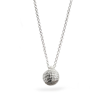 polished silver pebble pendant with words on white background 