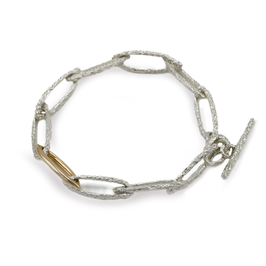 silver and gold textured link bracelet 