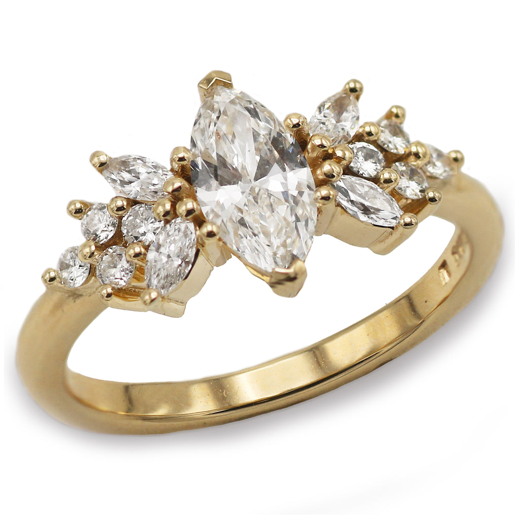 9ct Yellow Gold Ring with a Marquise and Round Diamonds  on white background 