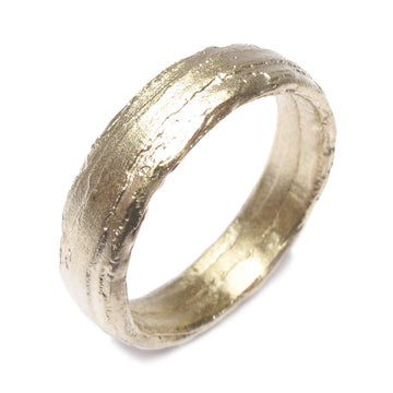 Textured Wedding Ring 6mm in Fairtrade 9ct yellow gold on a white background