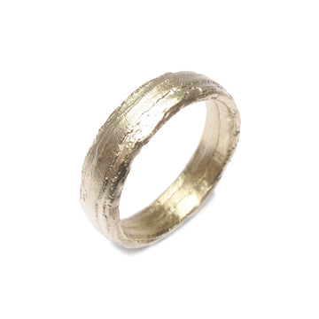 Textured Wedding Ring 6mm in Fairtrade 9ct yellow gold on a white background