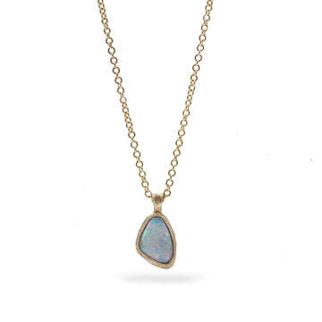 Textured Yellow Gold Pendant Set With A Freeform Australian Opal Worn On Model