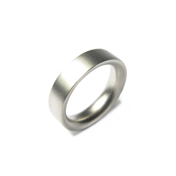 Men's Chunky Platinum Wedding Ring by Diana Porter Bristol on a white Background