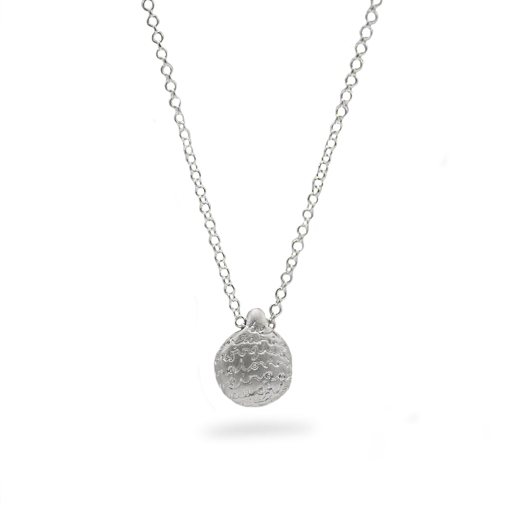 pebble-pendant-in-silver-with-etched-words-on-white-background