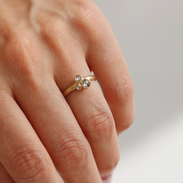 Yellow Gold Textured Cluster Ring with Salt and Pepper Diamonds worn on hand 
