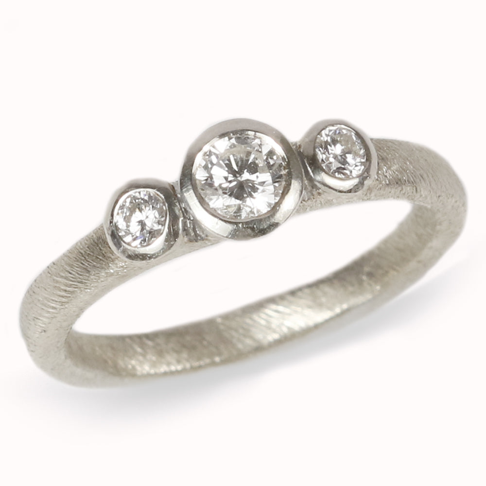 White Gold Diamond Trilogy Ring on white background 