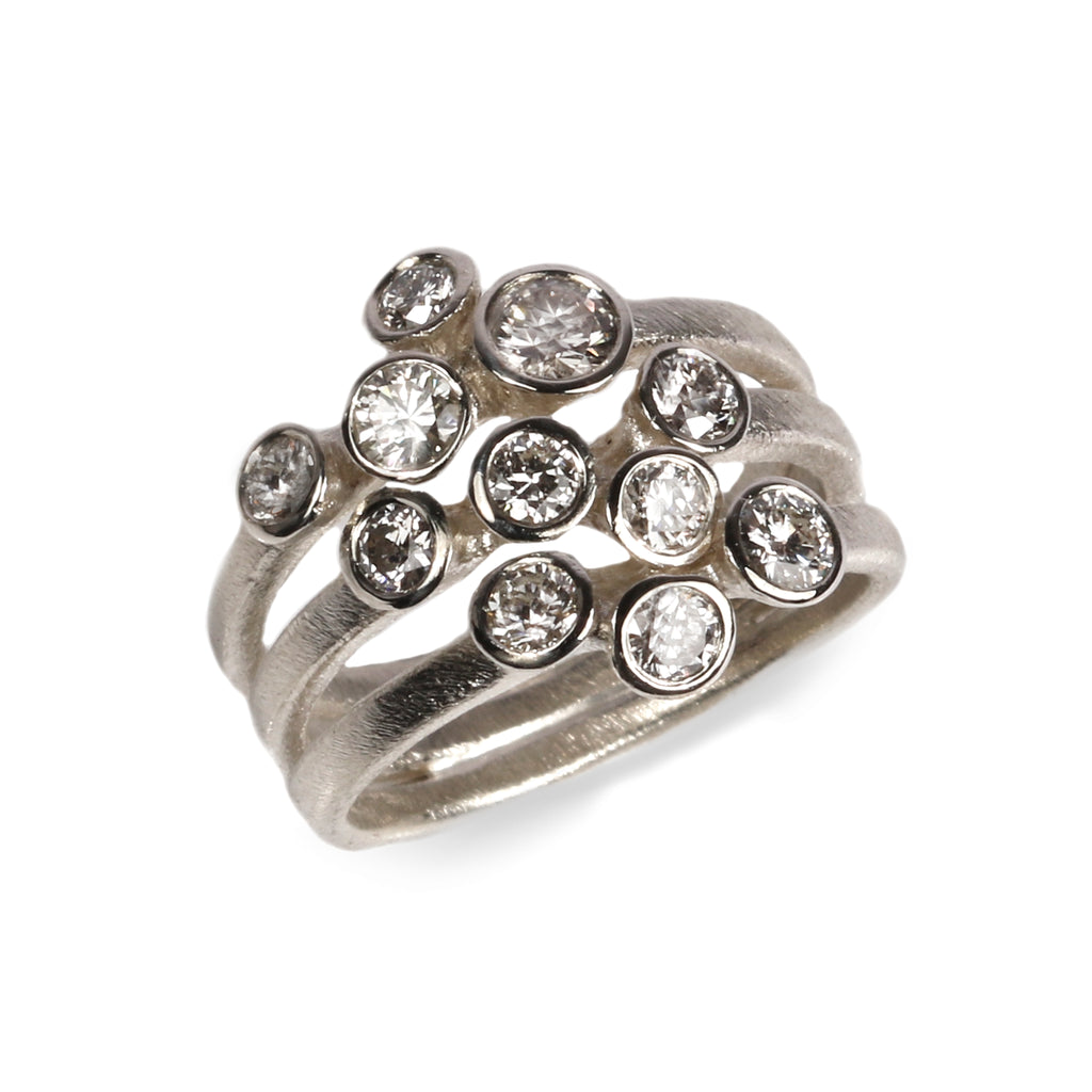 Bespoke- 18ct white gold ring with eleven diamonds