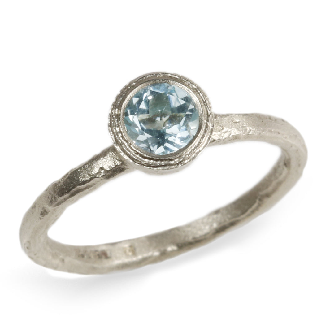 Aquamarine ring in etched 9ct Fairtrade white gold