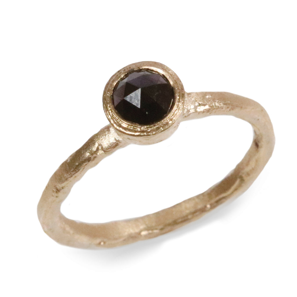 Yellow Gold Solitaire Ring with Black Rose Cut Diamond on white background 