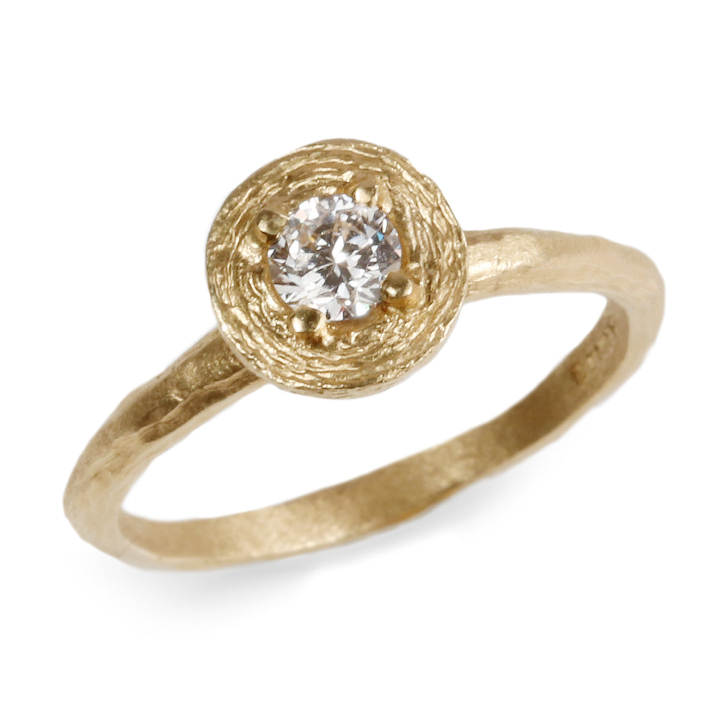Modern yellow Gold Ring Claw Set With Brilliant Cut Diamond  on white background 