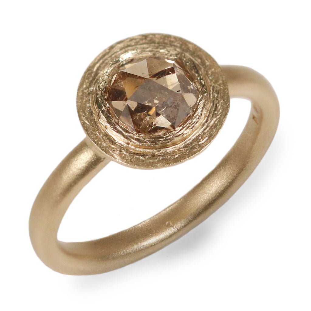 Yellow Gold Ring with a Rose Cut Champagne Diamond on white background 