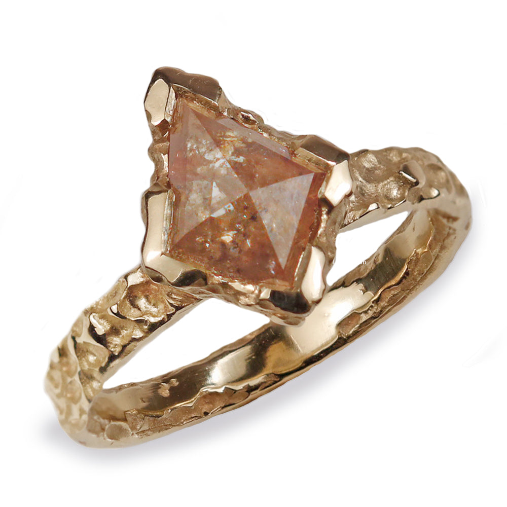 Yellow Gold Molten Ring Set with a Kite Rose Cut Diamond on white background 