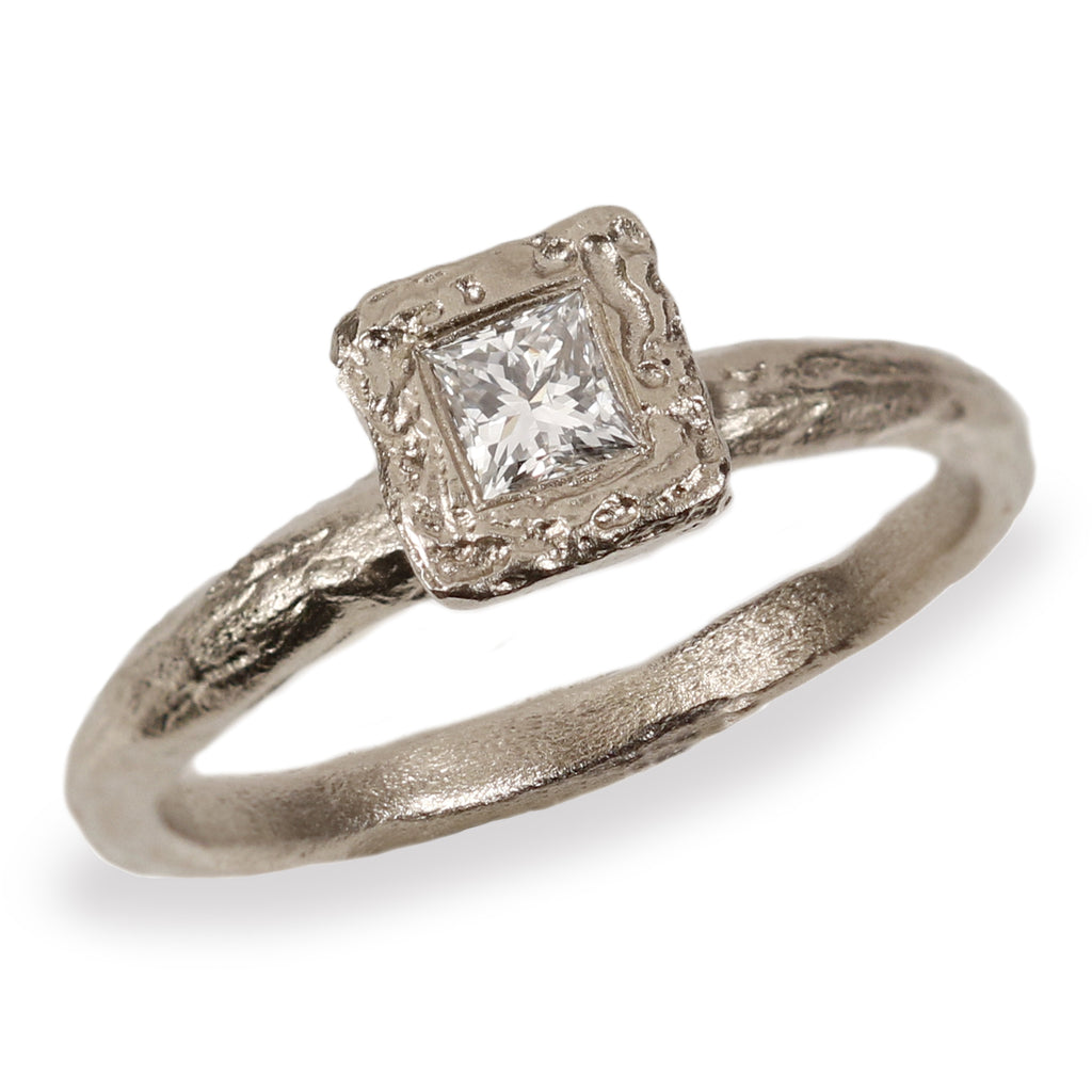 Textured White Gold Engagement Ring with Princess Cut Diamond  on white background 