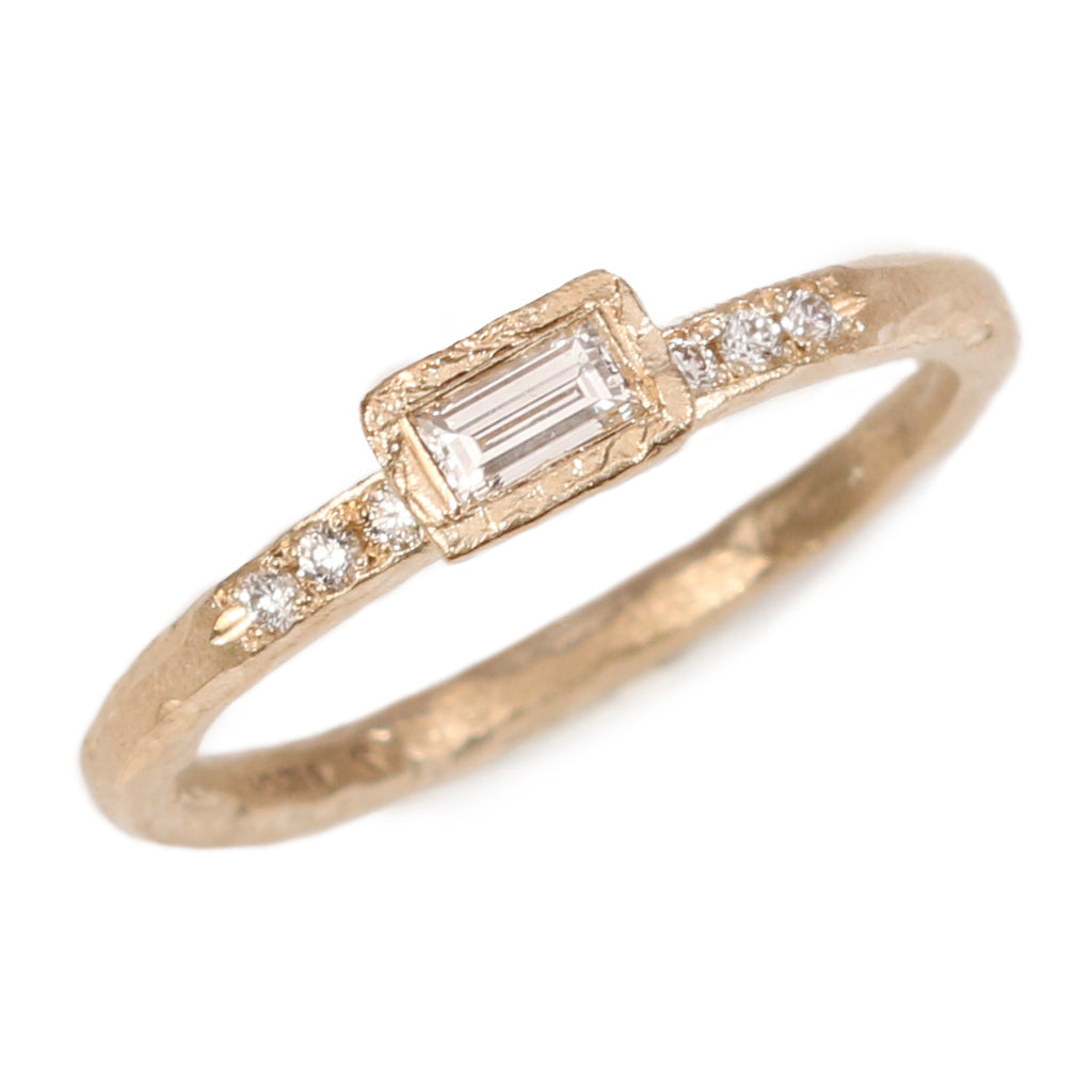 Yellow Gold Textured Ring with a Baguette and Round Diamonds