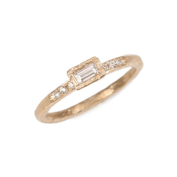 Yellow Gold Textured Ring with a Baguette and Round Diamonds