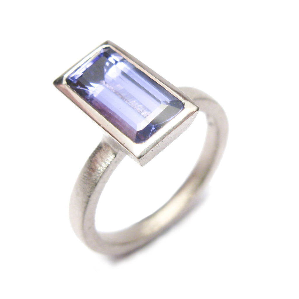 bespoke commissioned 18ct white gold ring with customers own, emerald cut, tanzanite