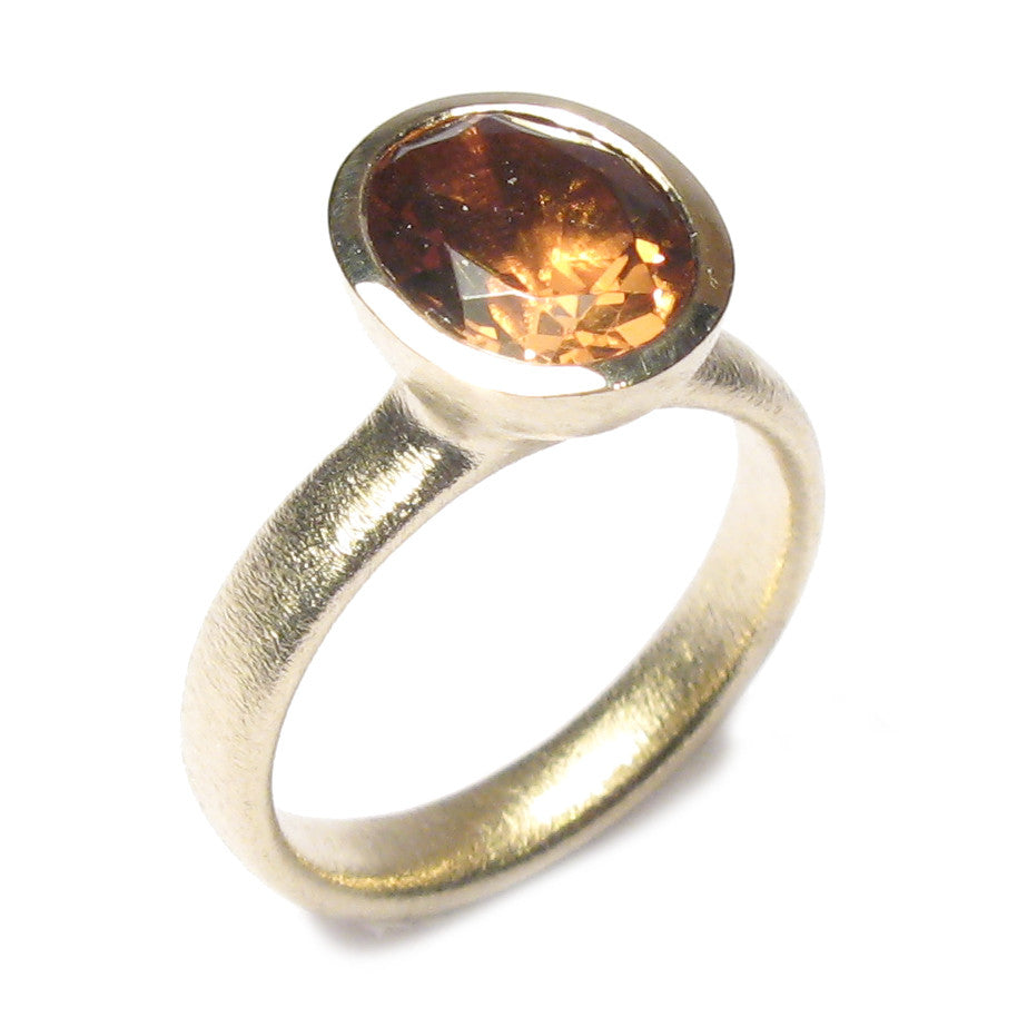 Bespoke, commissioned 9ct yellow gold ring set with customers own, oval cut, Zultanite. 