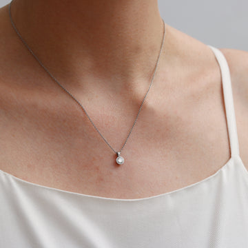 Platinum Etched Pendant Set with a Diamond on Platinum Chain