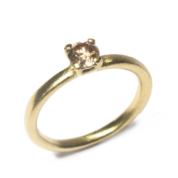 Yellow Gold Ring with Claw Set Single Champagne Diamond on white background
