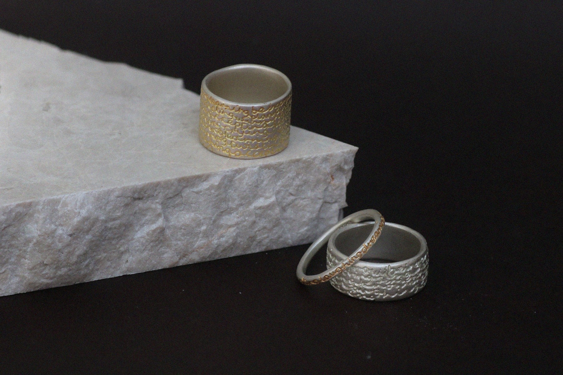 a selection of etched rings in silver and gold | Diana Porter Jewellery