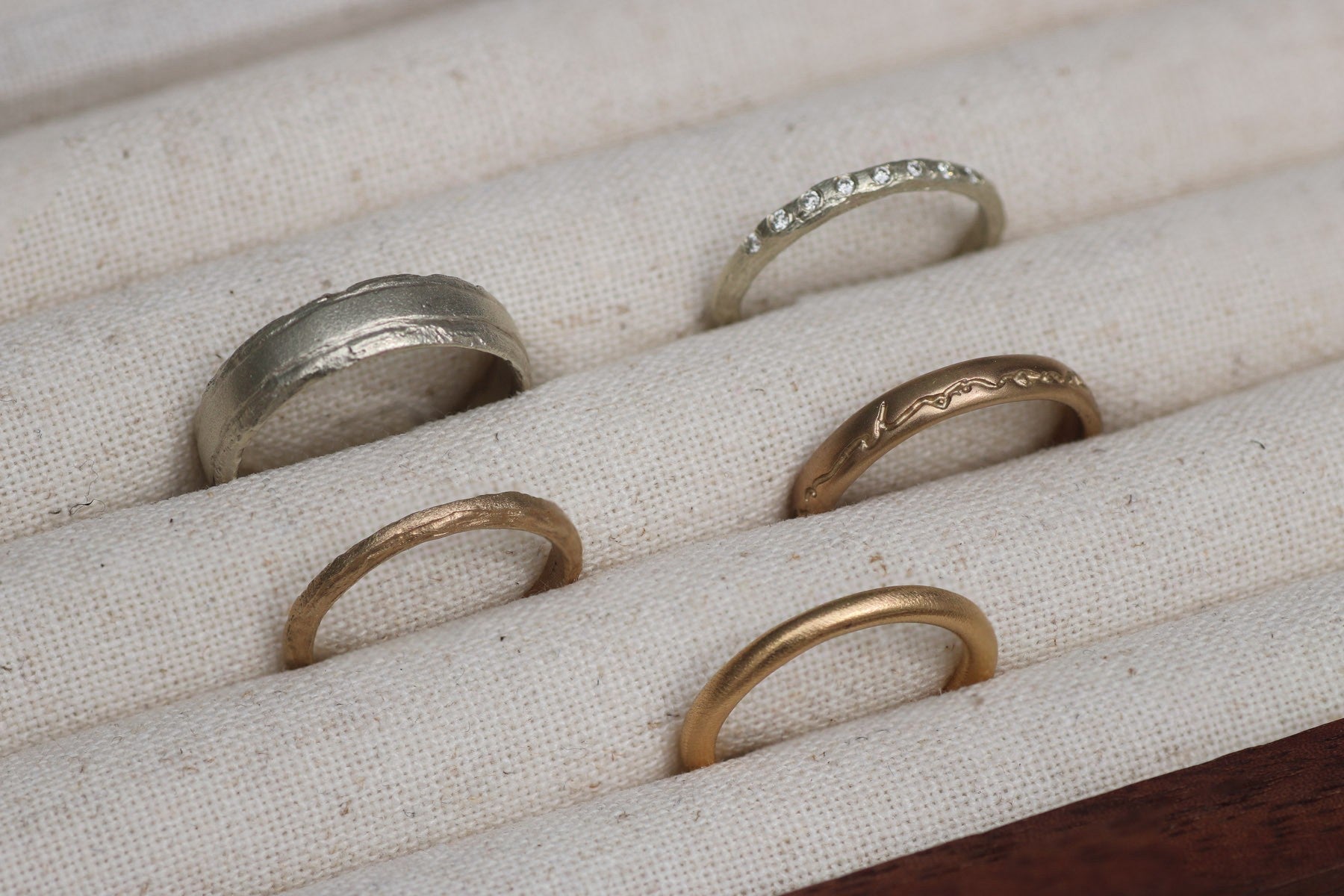 A selection of contemporary women's wedding rings in gold, silver an rose gold | Diana Porter Jewellery