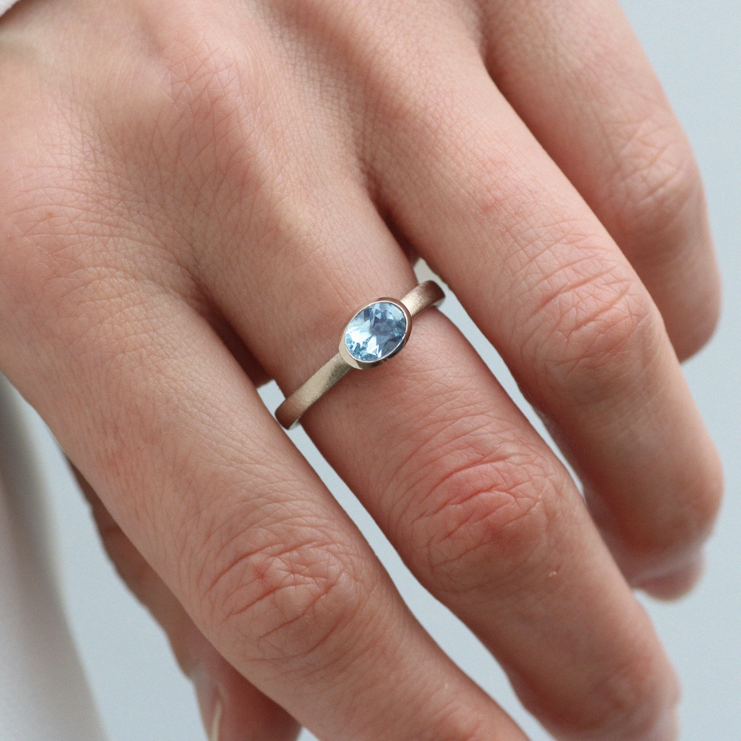 Textured White Gold Ring with Oval Blue Aquamarine