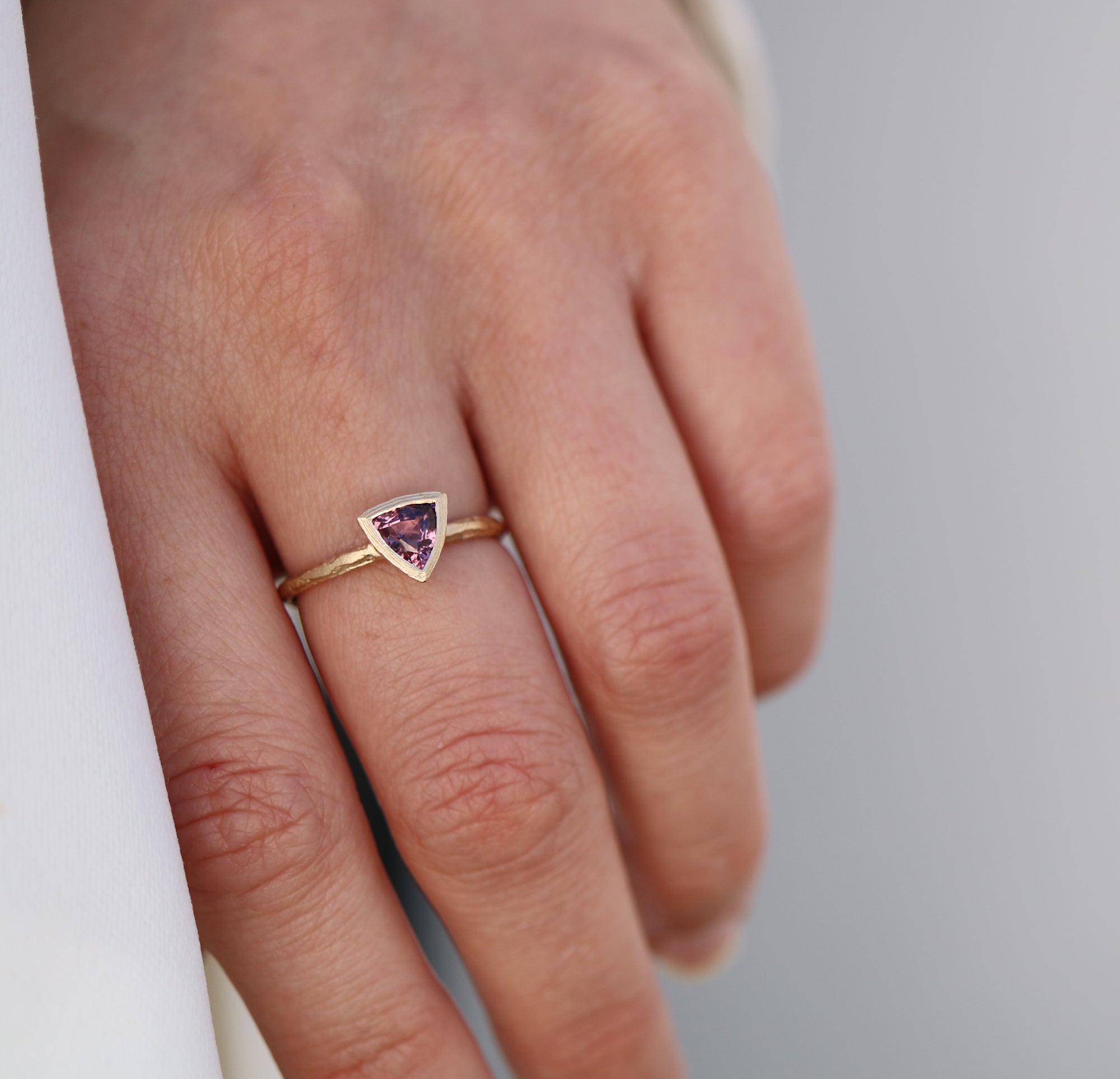 Yellow Gold Modern Ring with Purple Trillion Cut Spinel