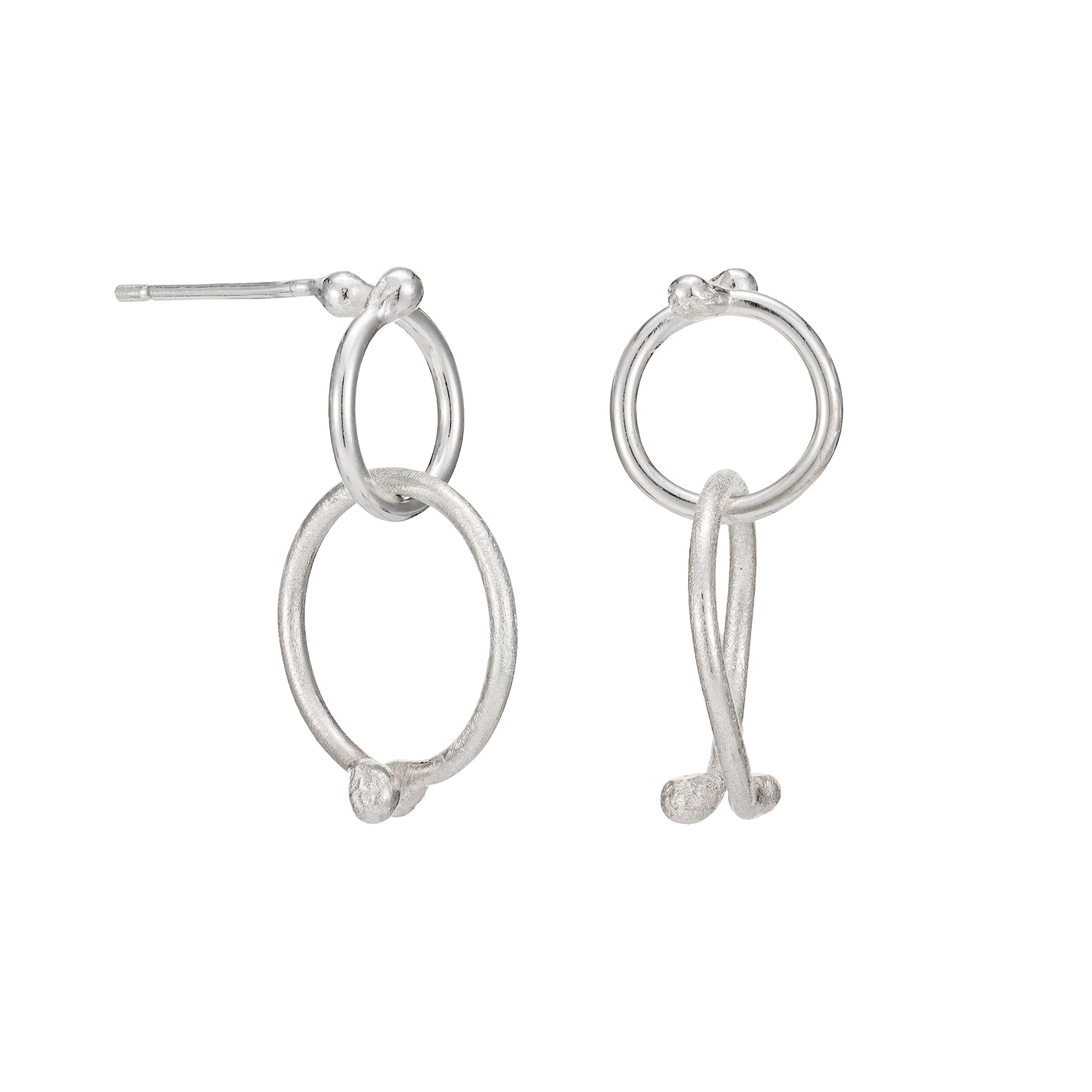 Pair of silver hoop earrings on a white background