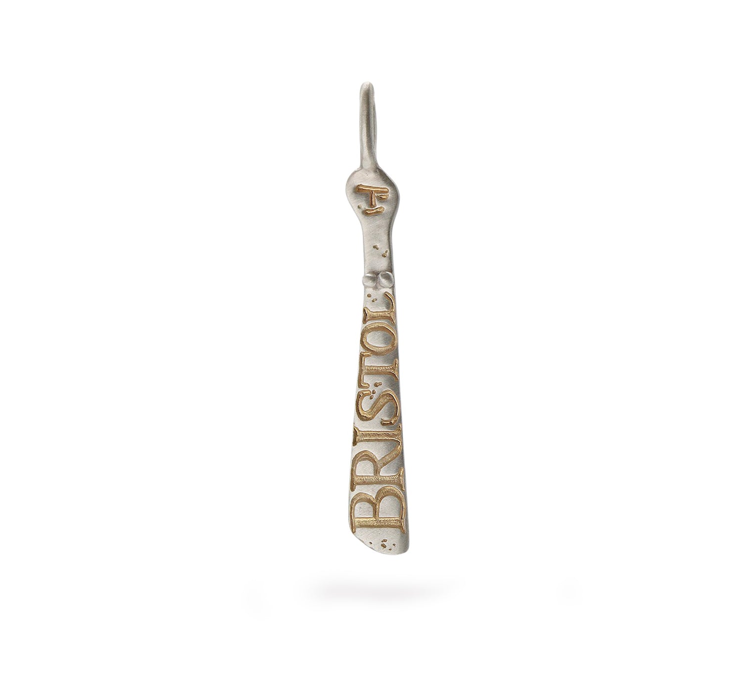 A silver sibyl etched with the word Bristol in gold etch 