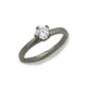 Platinum Ring Set with a Brilliant Cut Diamond in an Irregular Claw Setting