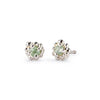 Pair of silver earrings with green gemstones on a white background