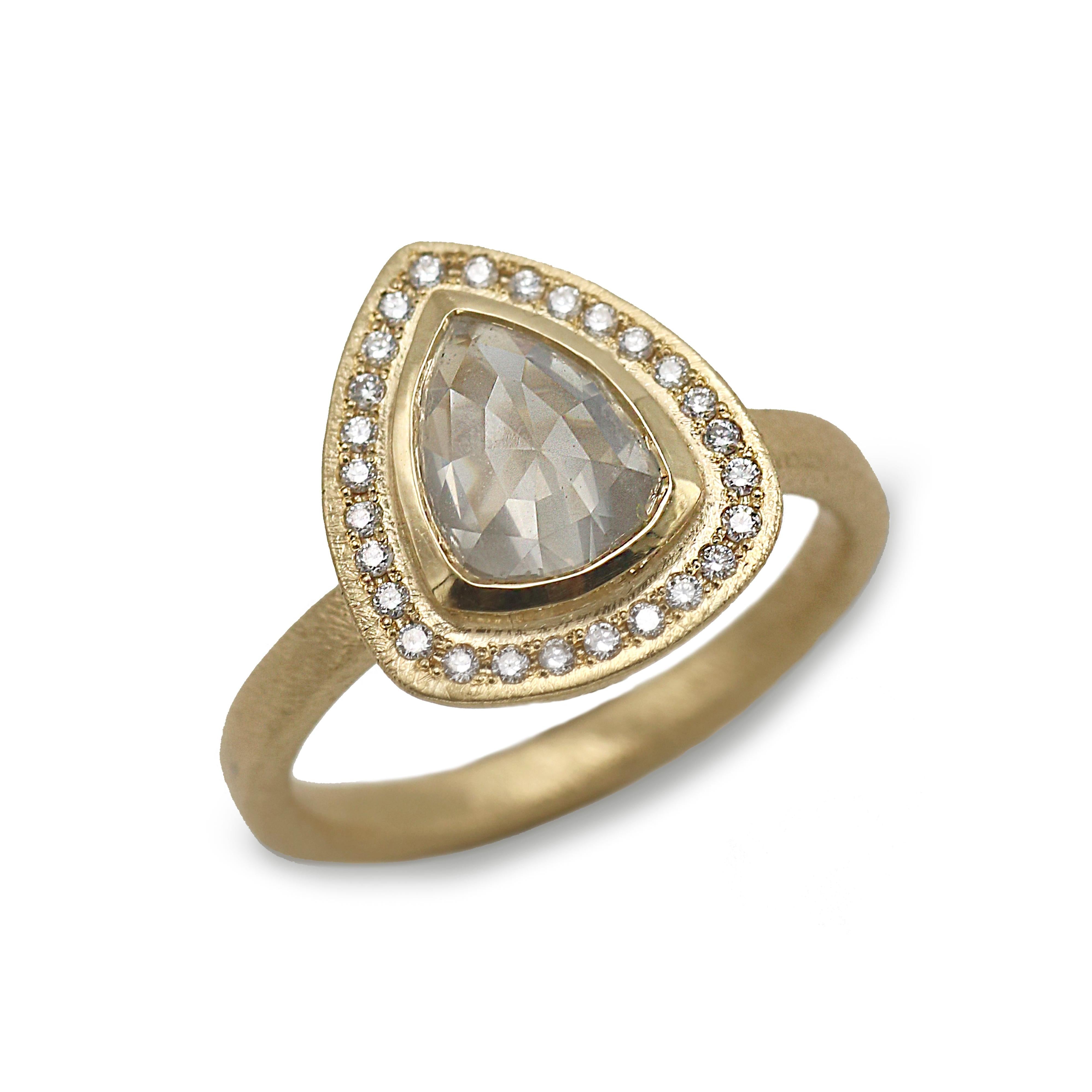 Yellow Gold Modern Halo Ring with a Shield Rose Cut Diamond on white background 