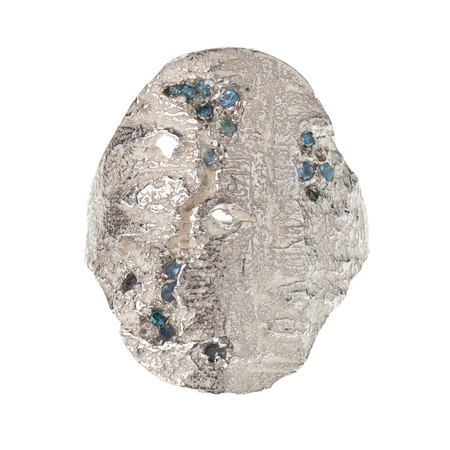 Decorative stone with embedded blue stones on a white background