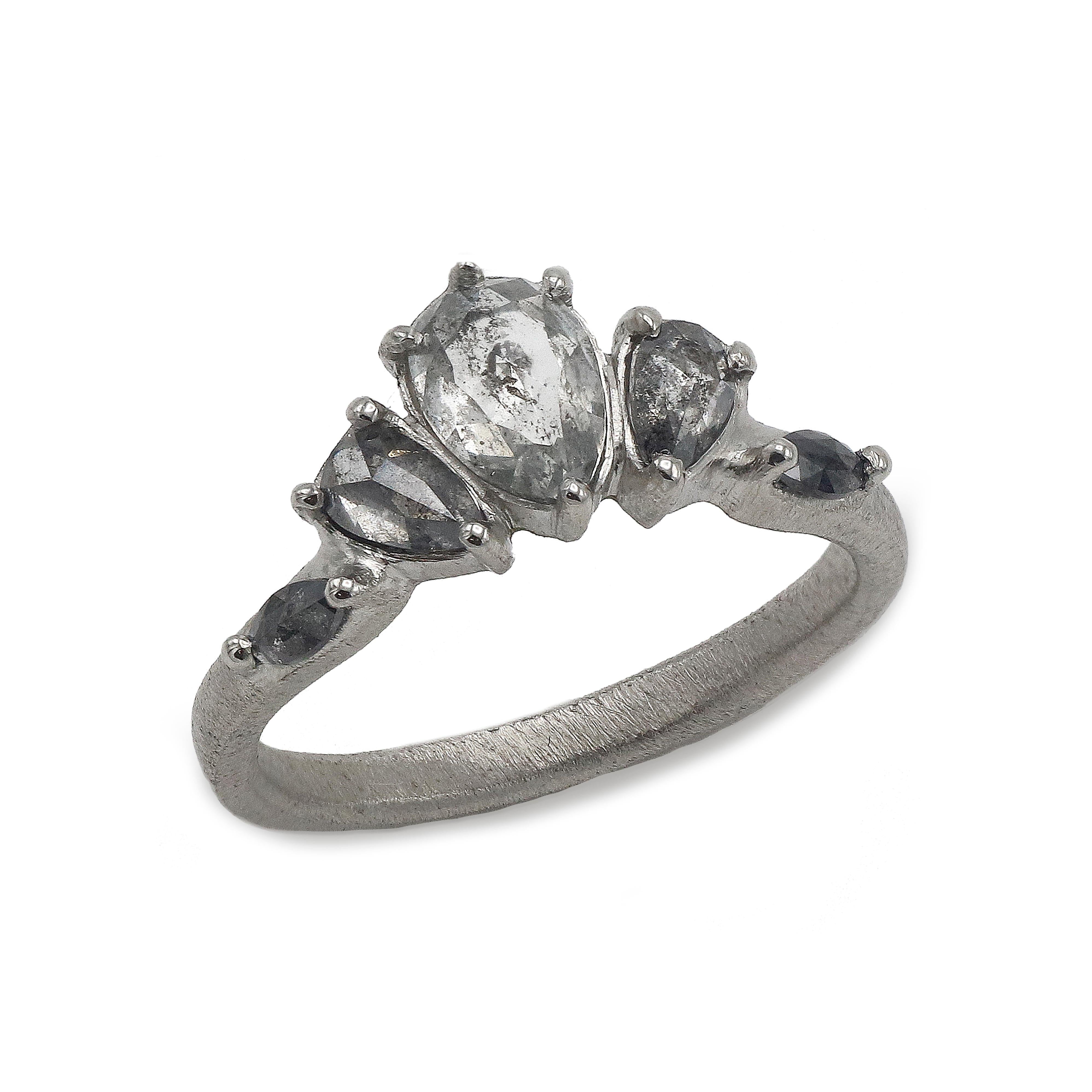 platinum salt and pepper diamond ring on white background  