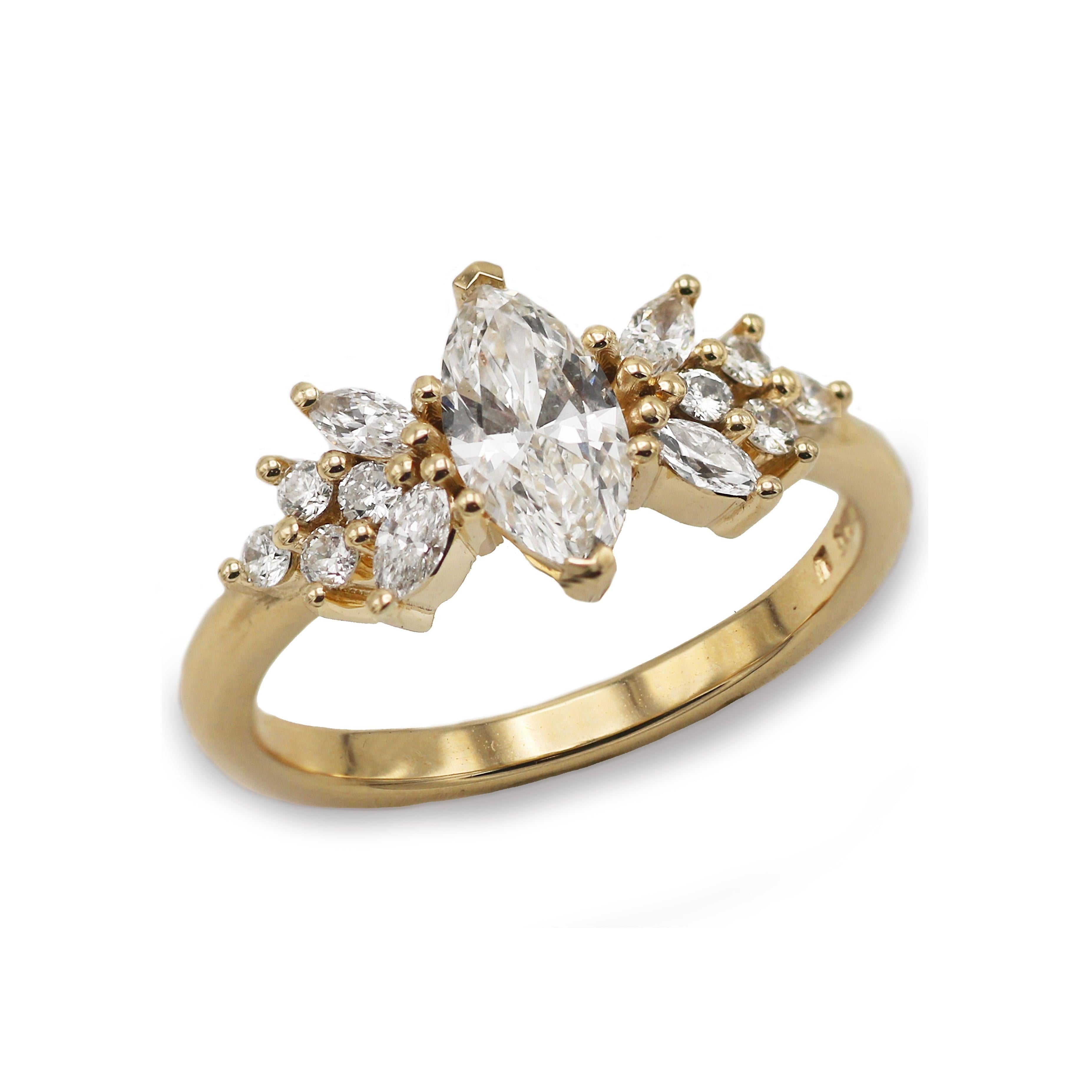 9ct Yellow Gold Ring with a Marquise and Round Diamonds  on white background 