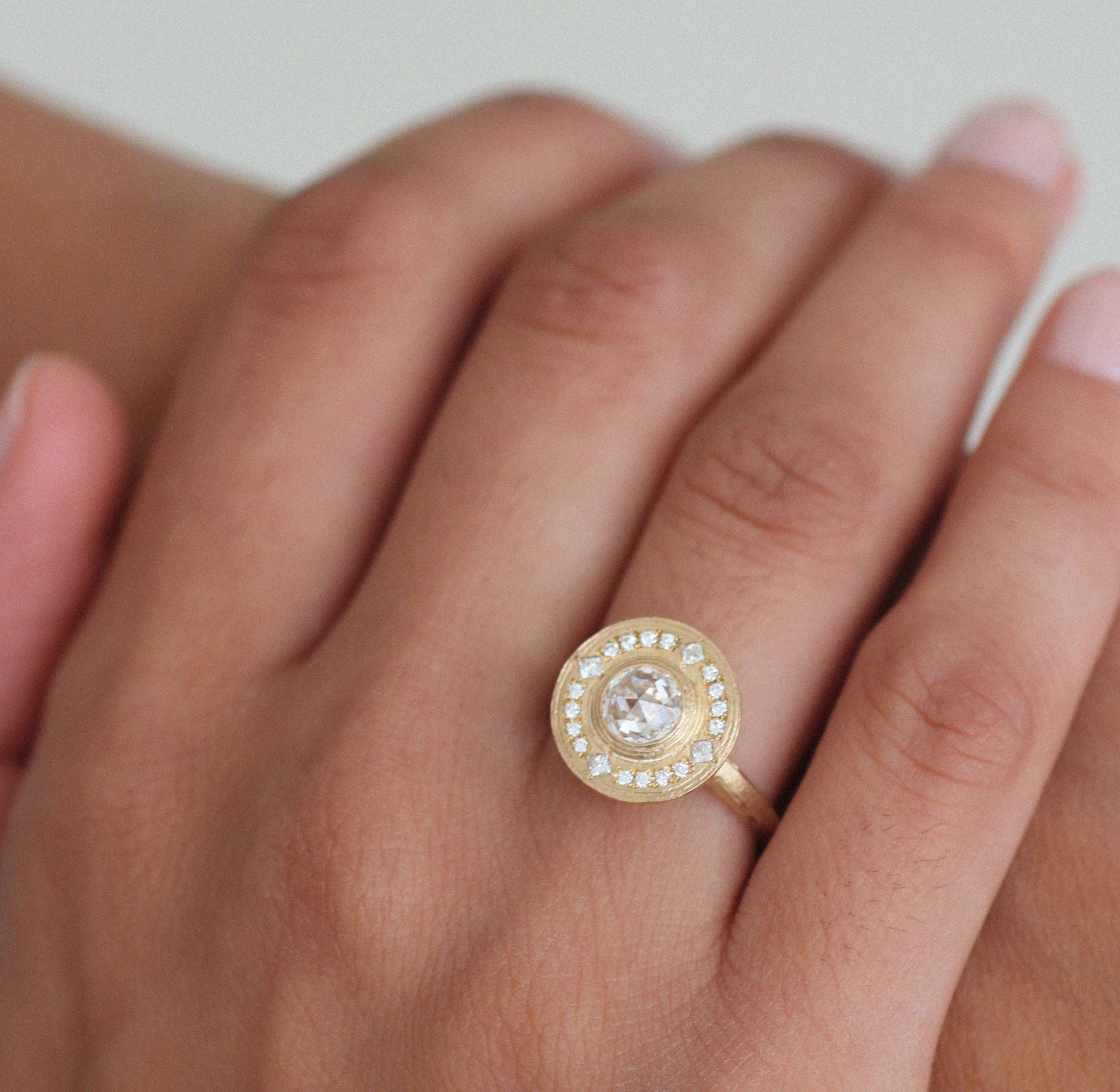 Textured Yellow Gold and Diamond Halo Engagement Ring