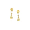 Gold earrings with small diamond-like stones on a white background