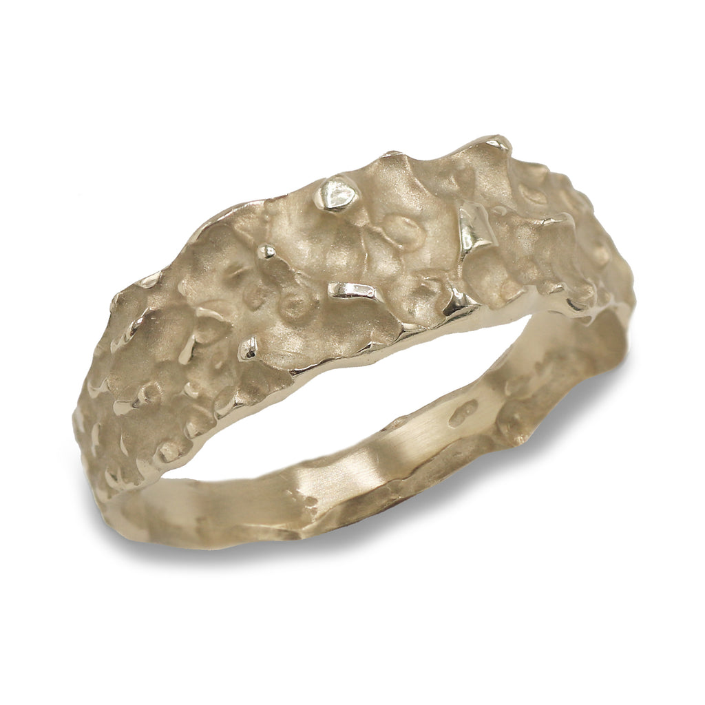 Unisex textured gold ring. 