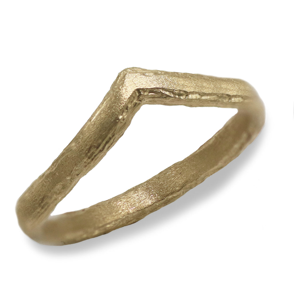 Yellow fold textured ring on a white background 
