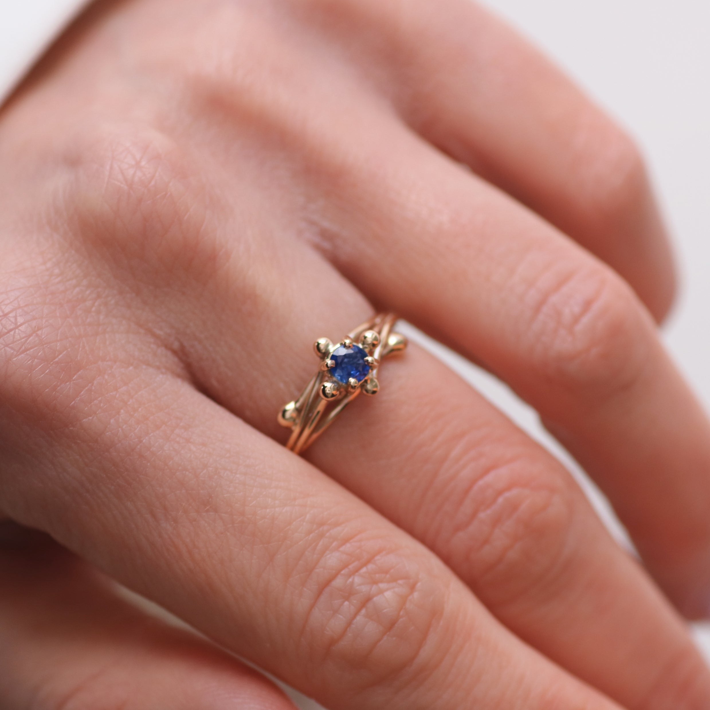 Yen Blue Sapphire Entwine Ring in 9ct Yellow Gold