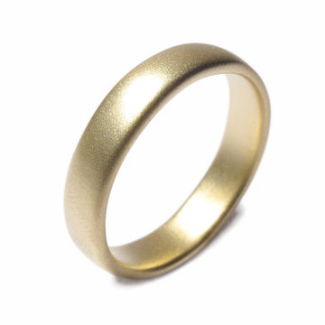 A plain 18ct Fairtrade Yellow Gold wedding ring displayed on a white background