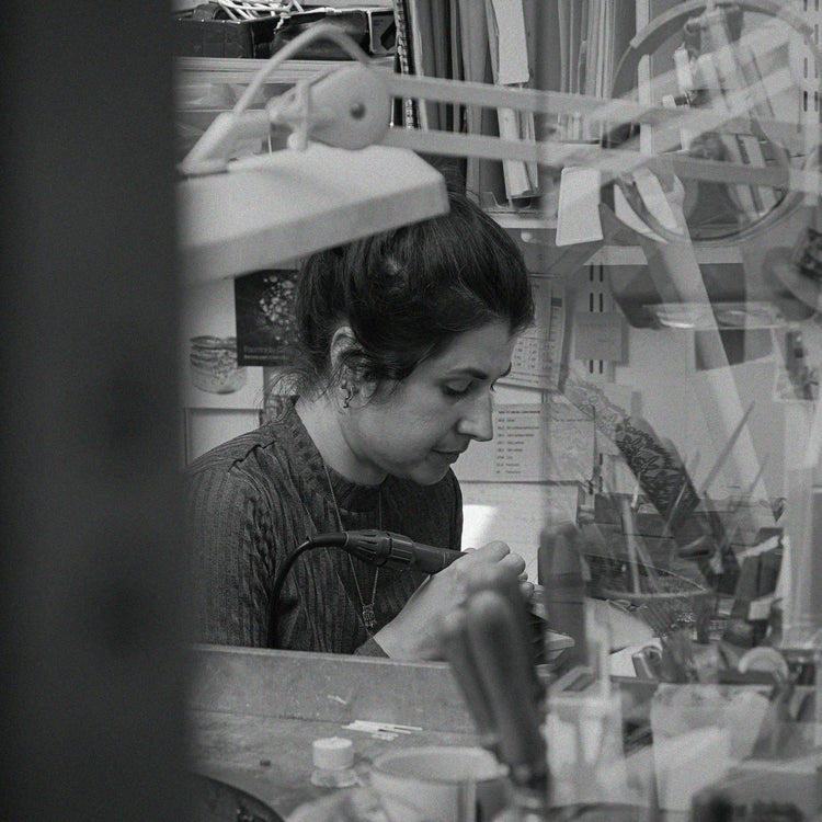 A jeweller working in the Diana Porter Bristol jewellery workshop