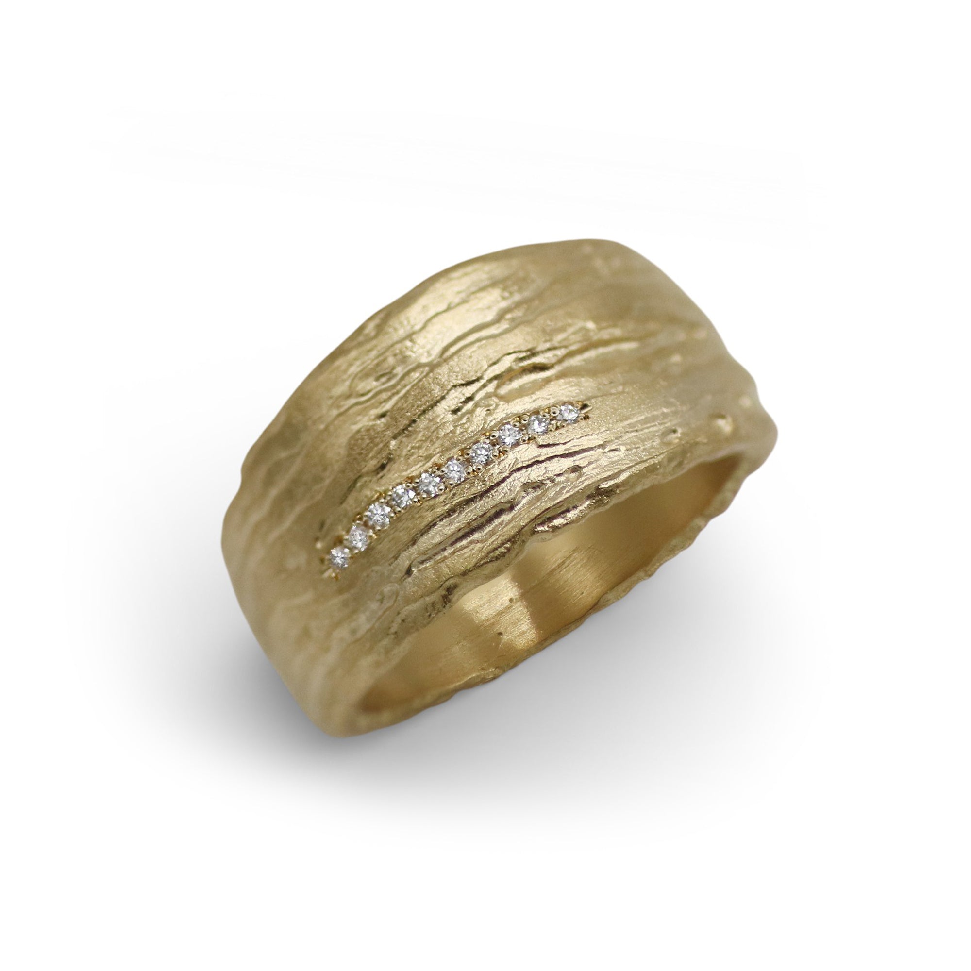 A wide textured band with a tapered edge and a scattering of white small diamonds 