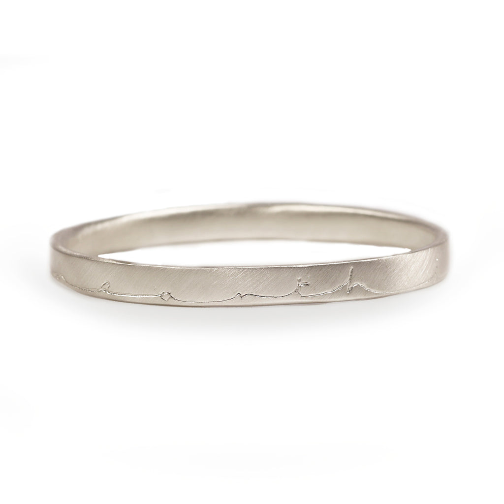 Wide Silver 'In Heaven On Earth' Bangle