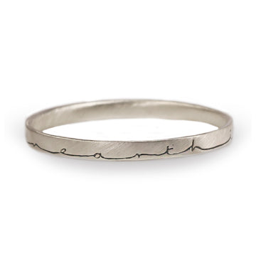 Wide Silver 'In Heaven On Earth' Bangle