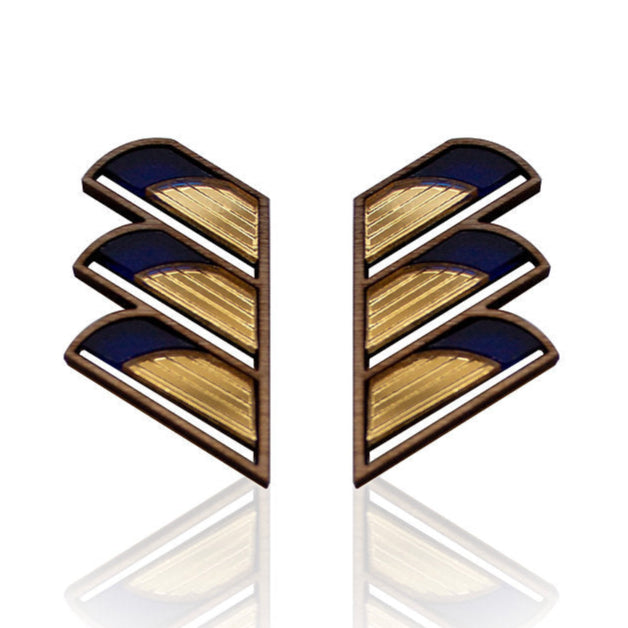Art deco inspired statement earrings by Chalk jewellery in gold and navy on a white background