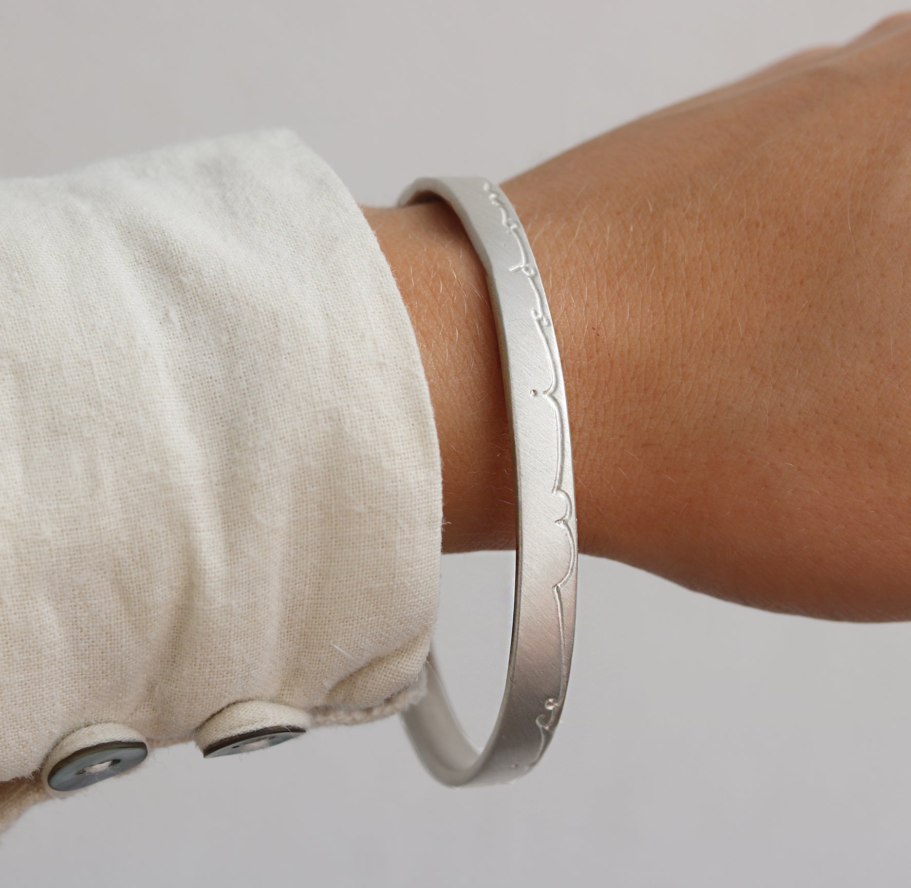 Wide Silver 'Wisdom Of Life' Bangle