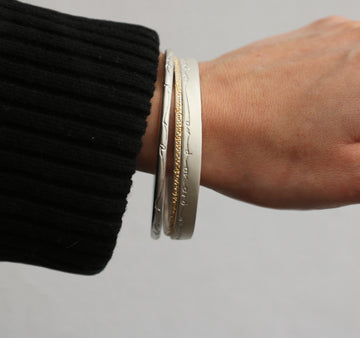 Wide Silver 'on and on' Bangle